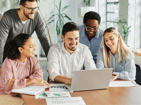 HR communicating around a computer at work