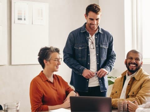Group of coworkers collaborating in a meeting room