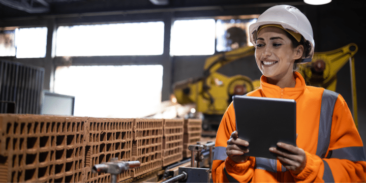A woman frontline worker in a construction material 